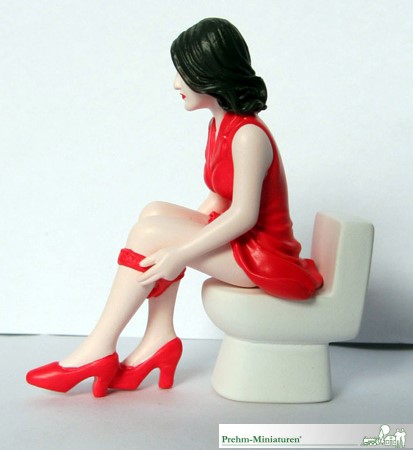 Seitenansicht - Frau auf Toilette
